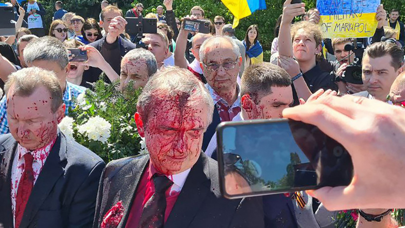 Russian ambassador to Poland attacked with red paint by pro-Ukraine activists in Warsaw