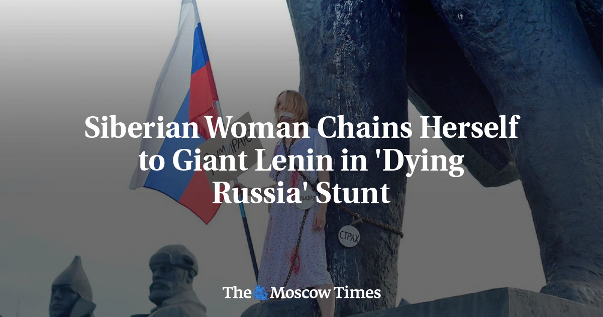 Siberian Woman Chains Herself to Giant Lenin in 'Dying Russia' Stunt