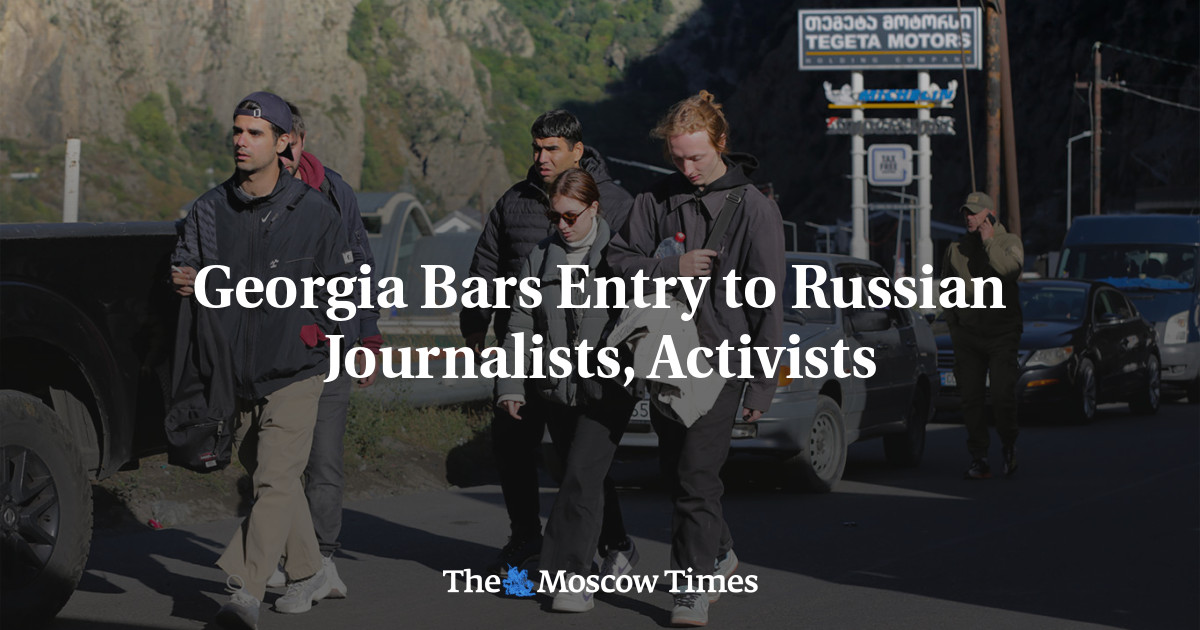 Bars Entry to Russian Journalists, Activists The Moscow Times