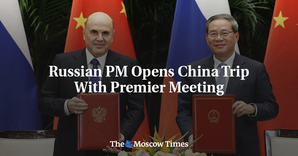 Russian PM Opens China Trip With Premier Meeting
